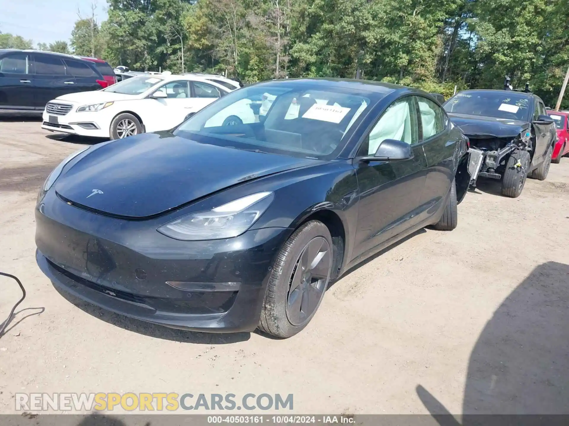 2 fotografías del automóvil dañado 5YJ3E1EBXNF349514 TESLA MODEL 3 2022