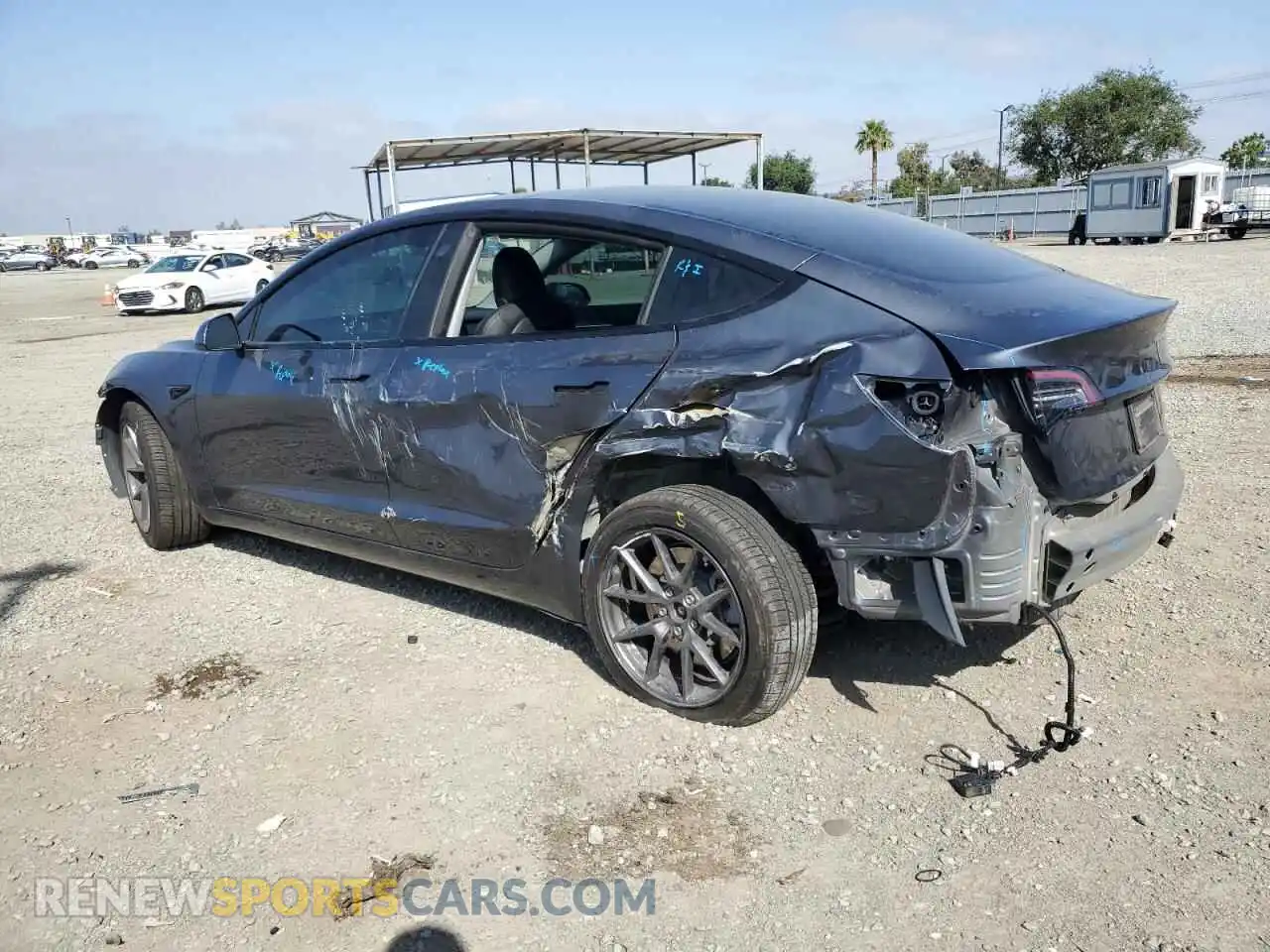 2 Photograph of a damaged car 5YJ3E1EBXNF360027 TESLA MODEL 3 2022