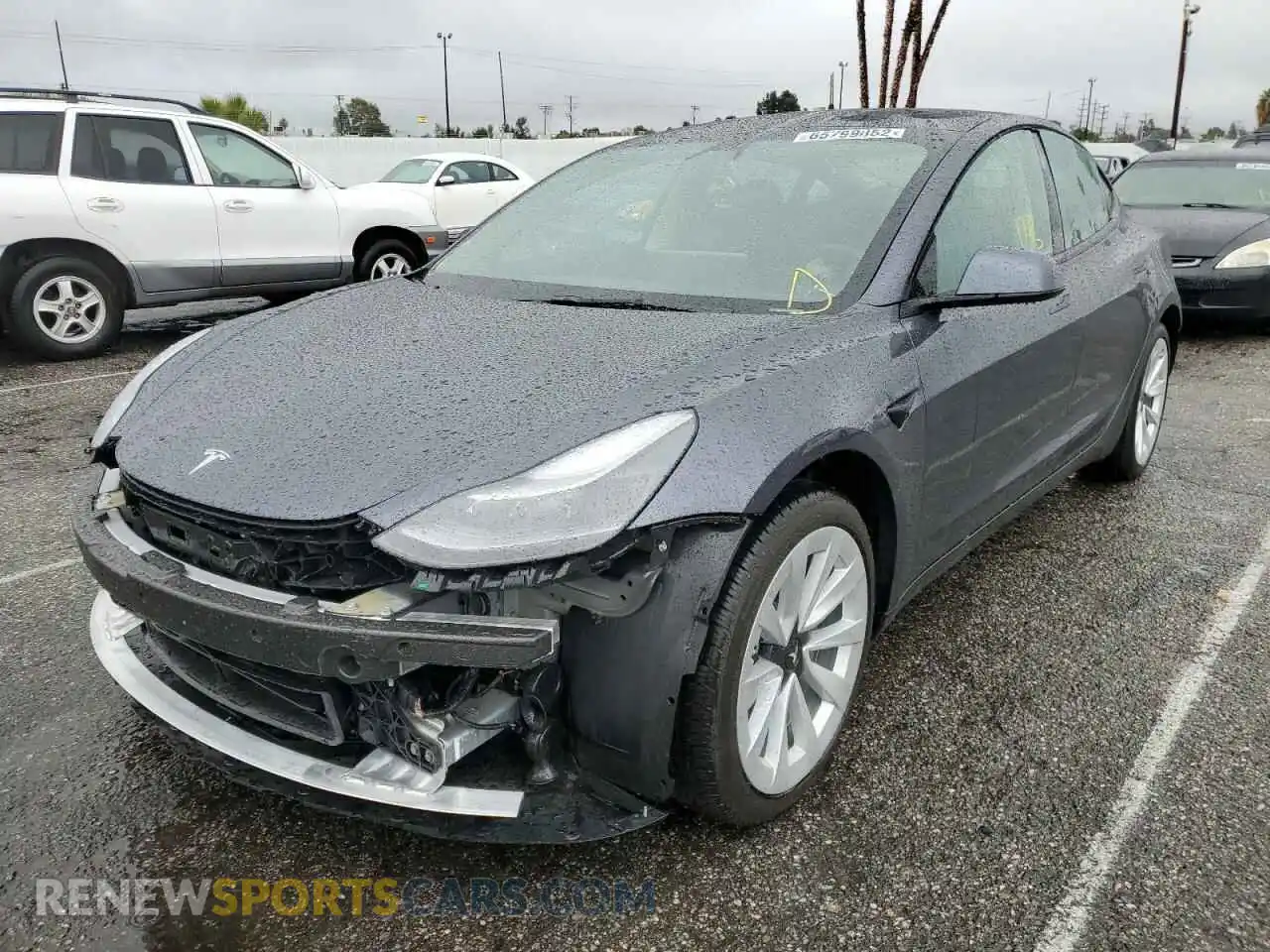 2 Photograph of a damaged car 5YJ3E1EBXNF367642 TESLA MODEL 3 2022