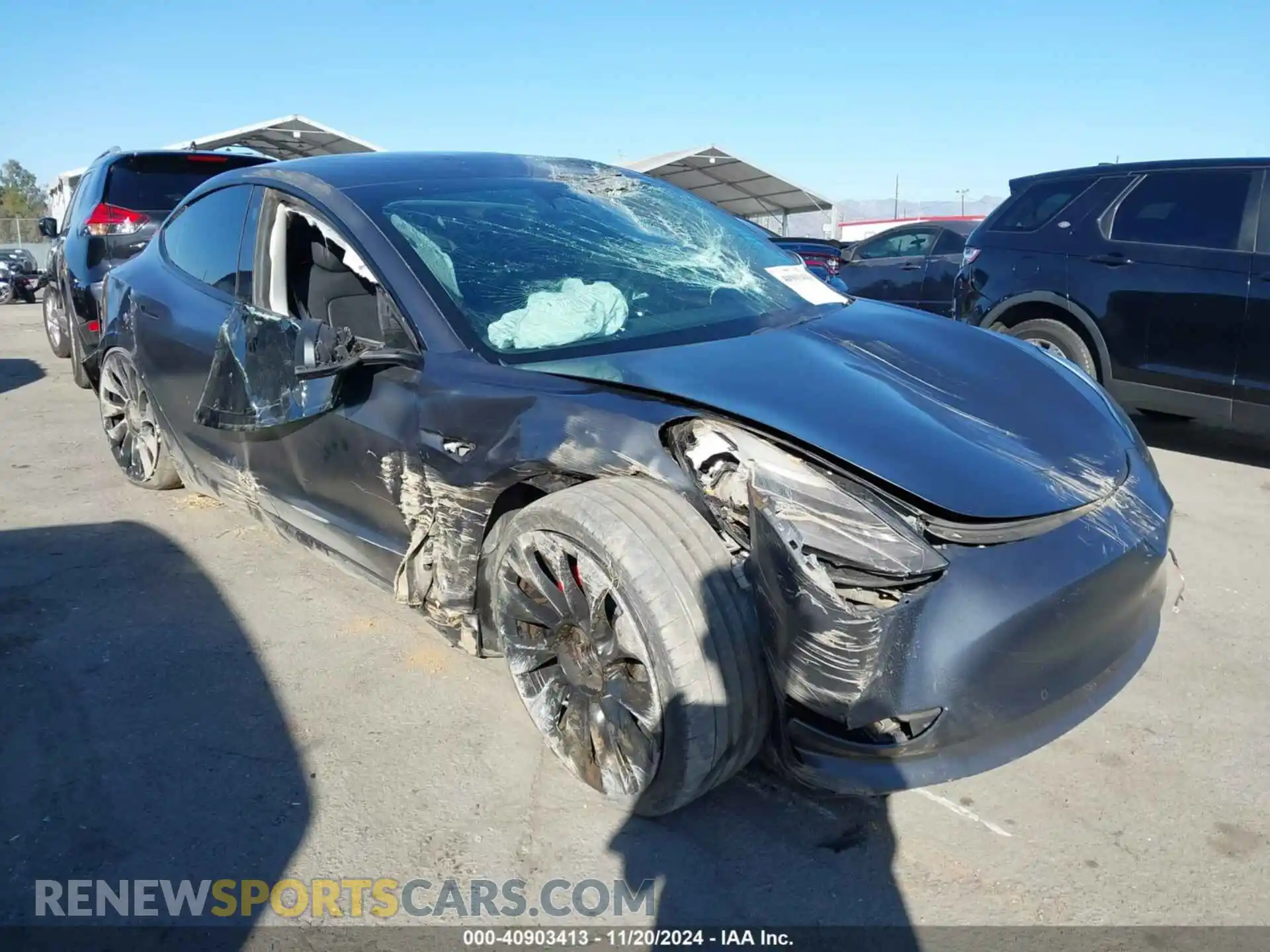 1 Photograph of a damaged car 5YJ3E1EC0NF248295 TESLA MODEL 3 2022