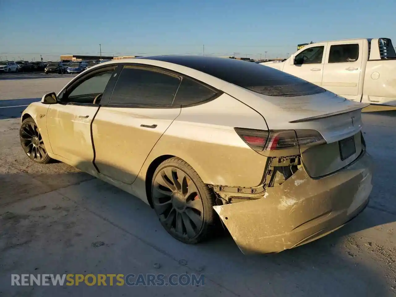 2 fotografías del automóvil dañado 5YJ3E1EC0NF315347 TESLA MODEL 3 2022