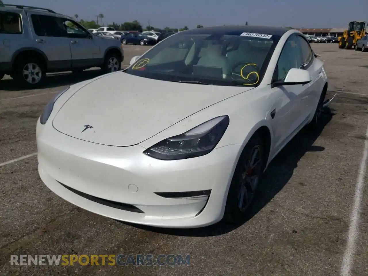 2 fotografías del automóvil dañado 5YJ3E1EC1NF131406 TESLA MODEL 3 2022