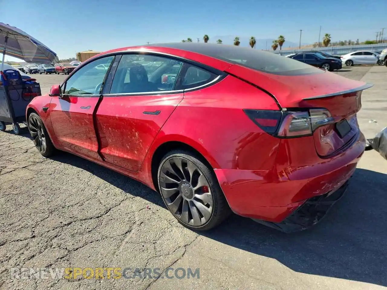 2 fotografías del automóvil dañado 5YJ3E1EC1NF359146 TESLA MODEL 3 2022