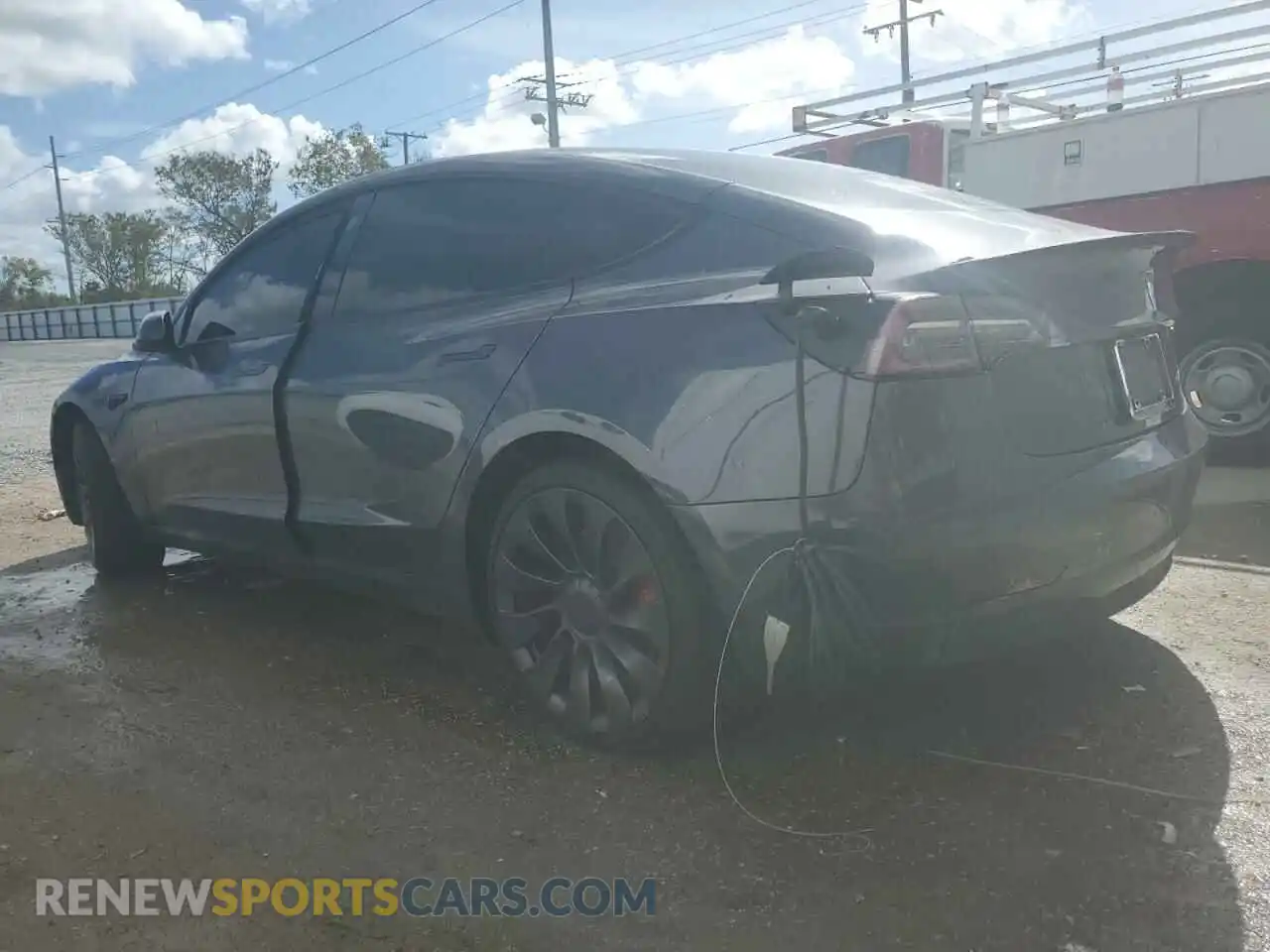 2 Photograph of a damaged car 5YJ3E1EC2NF127817 TESLA MODEL 3 2022
