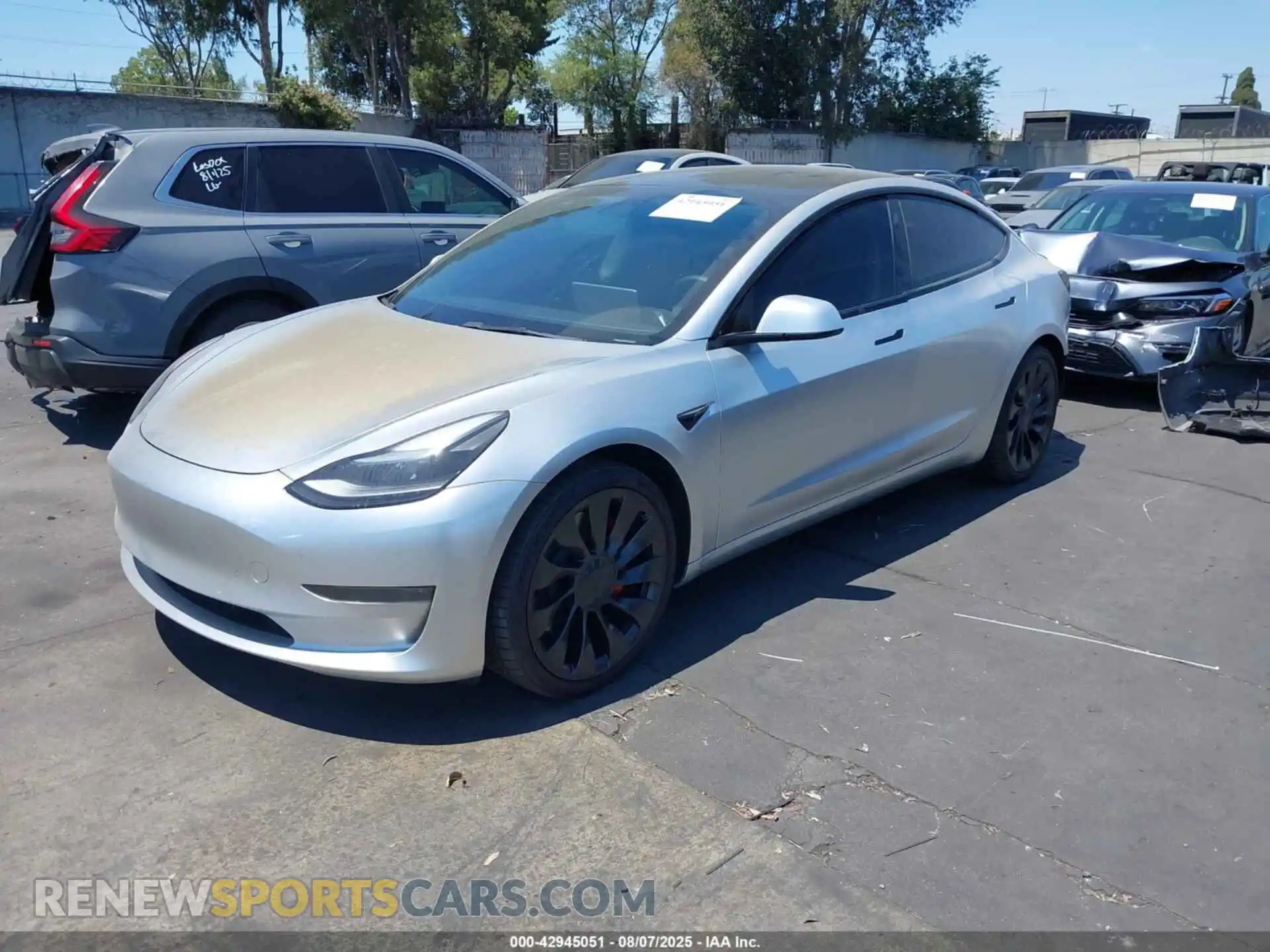 2 Photograph of a damaged car 5YJ3E1EC2NF203343 TESLA MODEL 3 2022