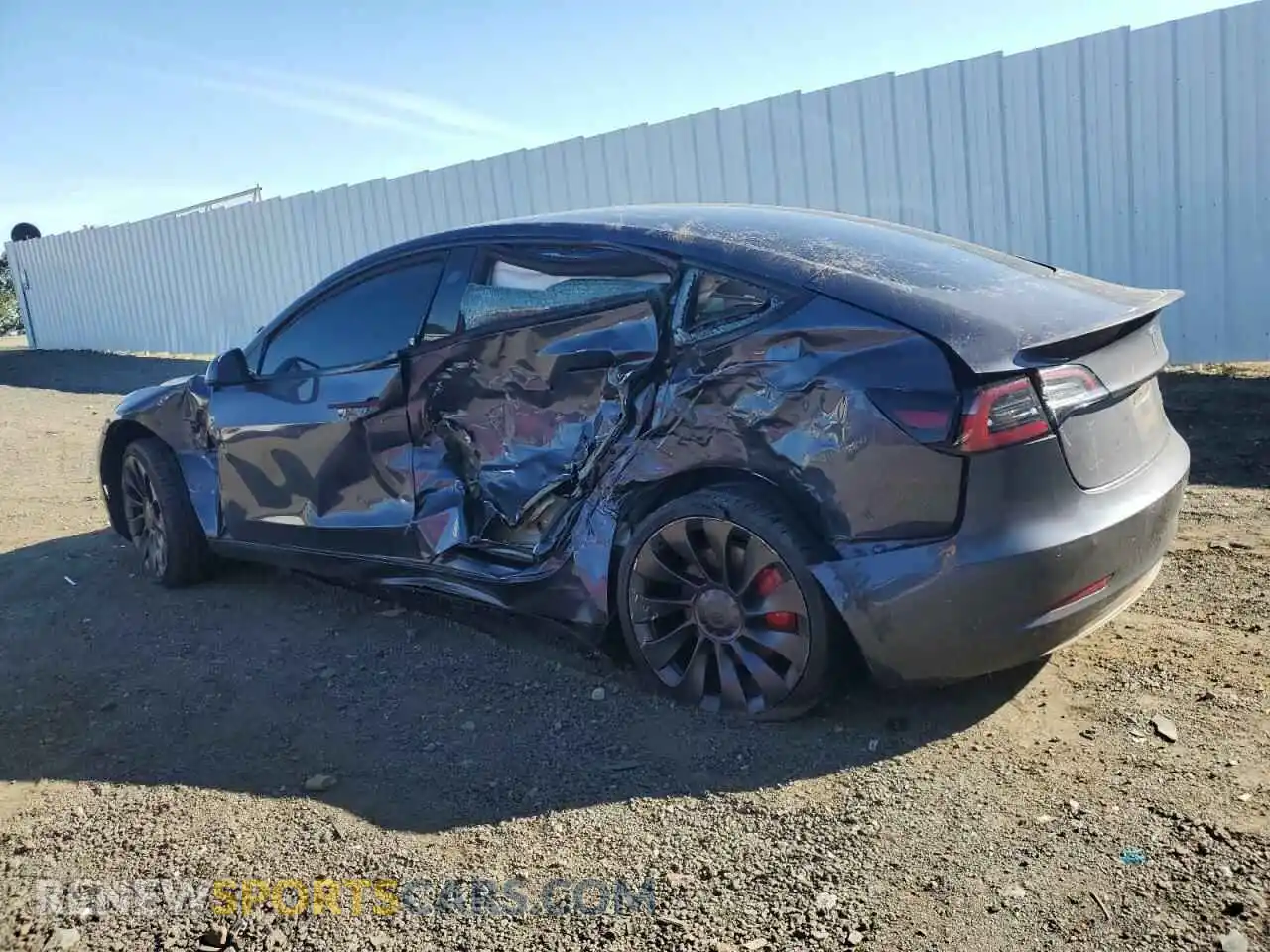 2 fotografías del automóvil dañado 5YJ3E1EC2NF261811 TESLA MODEL 3 2022