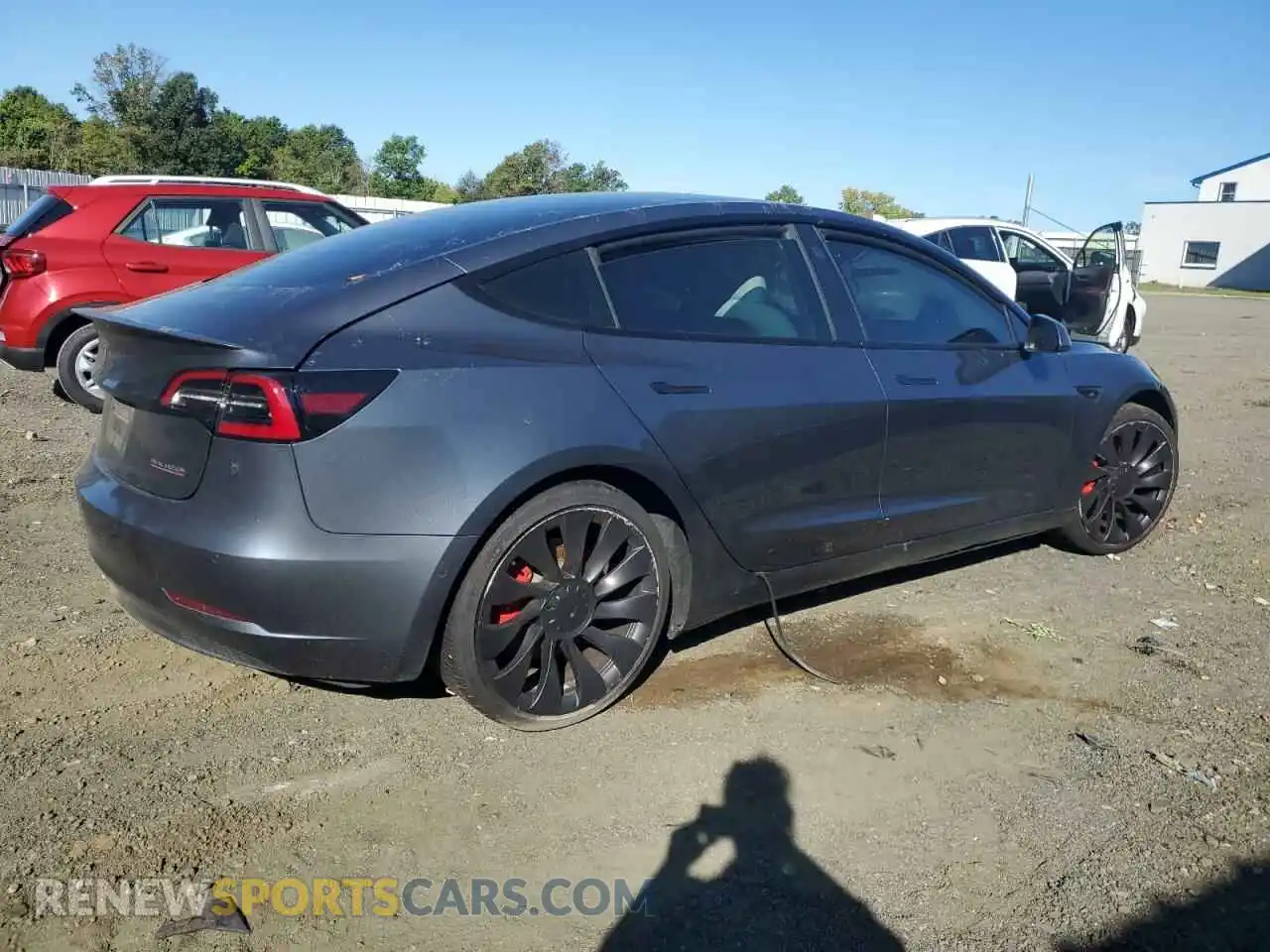 3 fotografías del automóvil dañado 5YJ3E1EC2NF261811 TESLA MODEL 3 2022