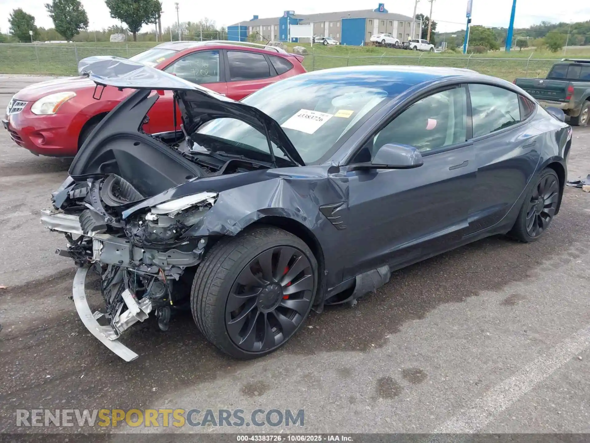 2 Photograph of a damaged car 5YJ3E1EC2NF306973 TESLA MODEL 3 2022