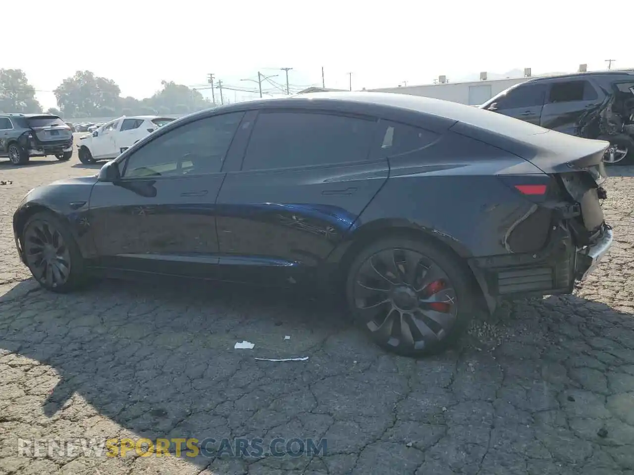 2 Photograph of a damaged car 5YJ3E1EC4NF209306 TESLA MODEL 3 2022