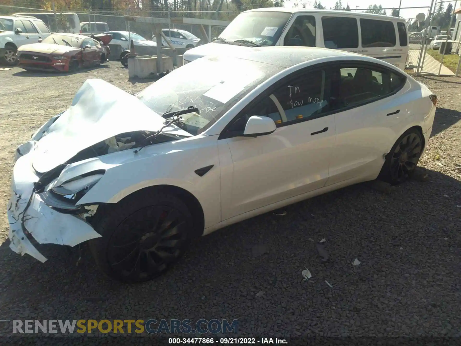 2 Photograph of a damaged car 5YJ3E1EC4NF269733 TESLA MODEL 3 2022