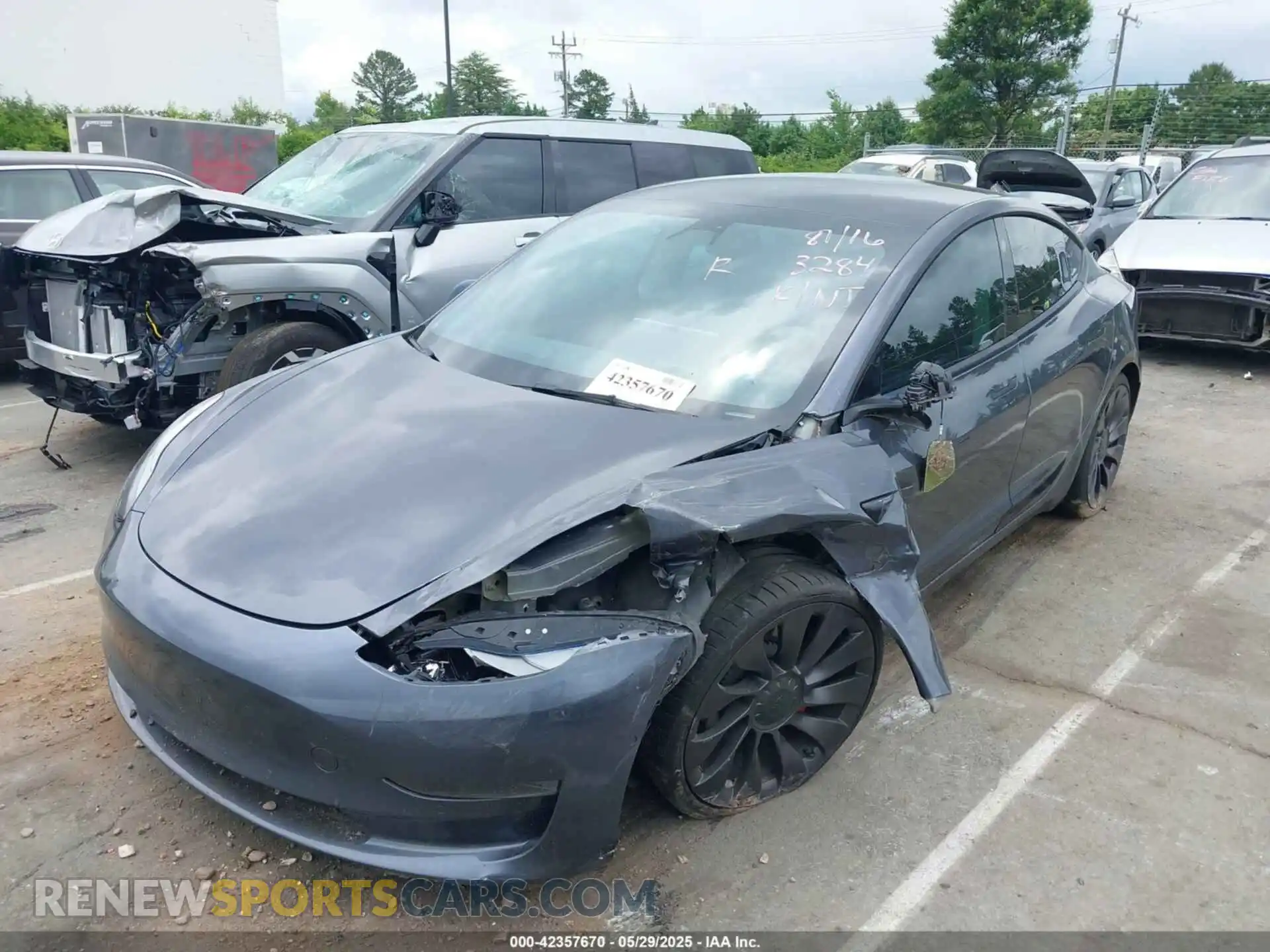 2 Photograph of a damaged car 5YJ3E1EC5NF103284 TESLA MODEL 3 2022