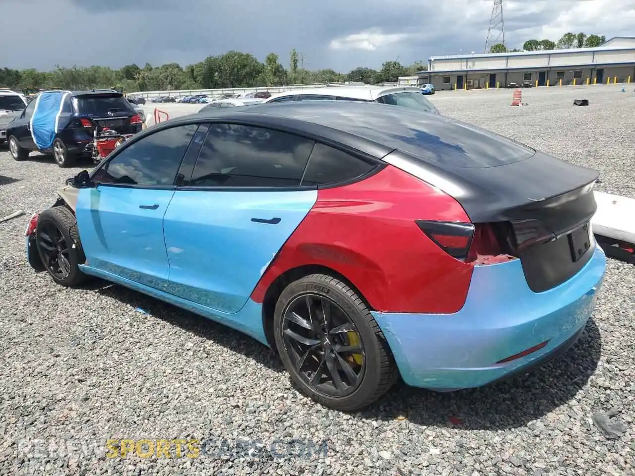 2 Photograph of a damaged car 5YJ3E1EC5NF125303 TESLA MODEL 3 2022