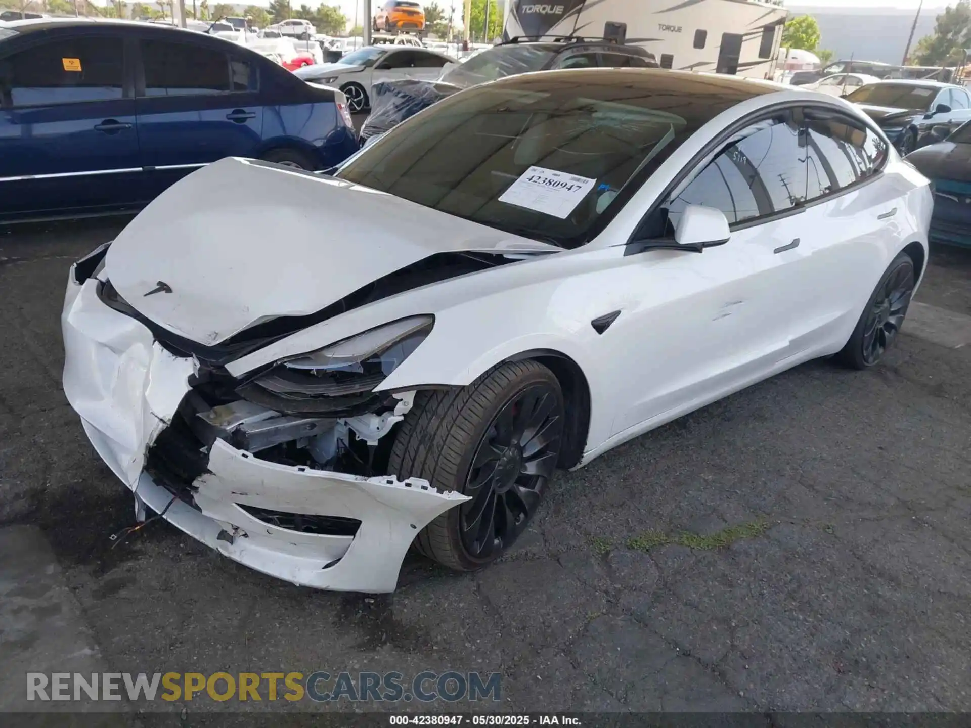 2 Photograph of a damaged car 5YJ3E1EC5NF195612 TESLA MODEL 3 2022