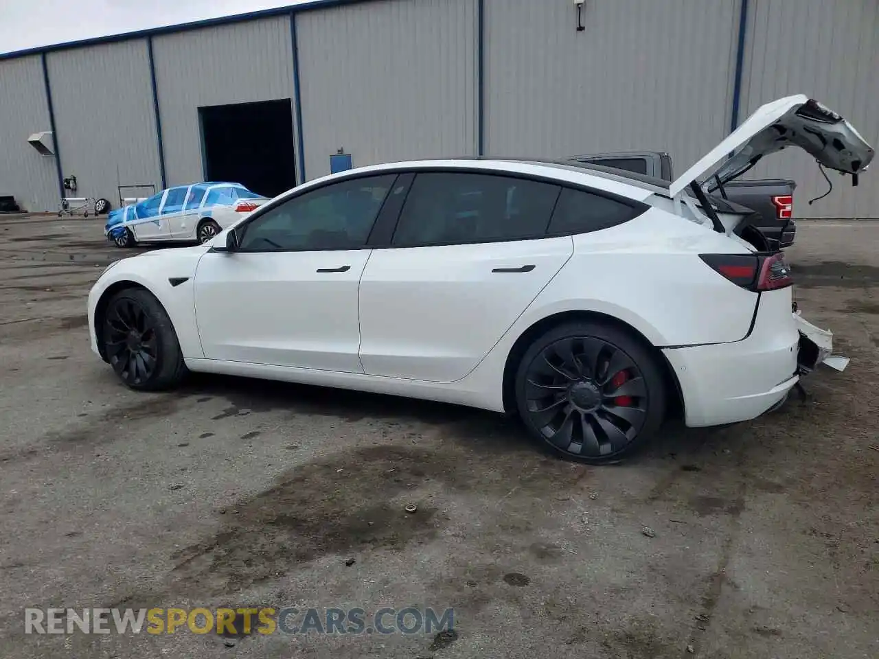 2 Photograph of a damaged car 5YJ3E1EC5NF276268 TESLA MODEL 3 2022