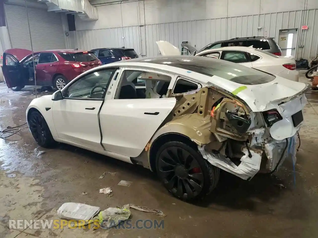 2 Photograph of a damaged car 5YJ3E1EC5NF299145 TESLA MODEL 3 2022