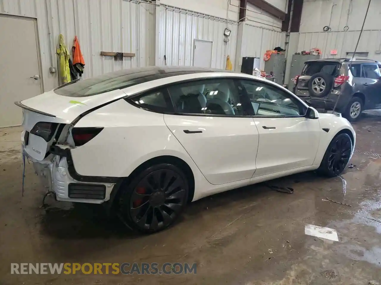 3 Photograph of a damaged car 5YJ3E1EC5NF299145 TESLA MODEL 3 2022