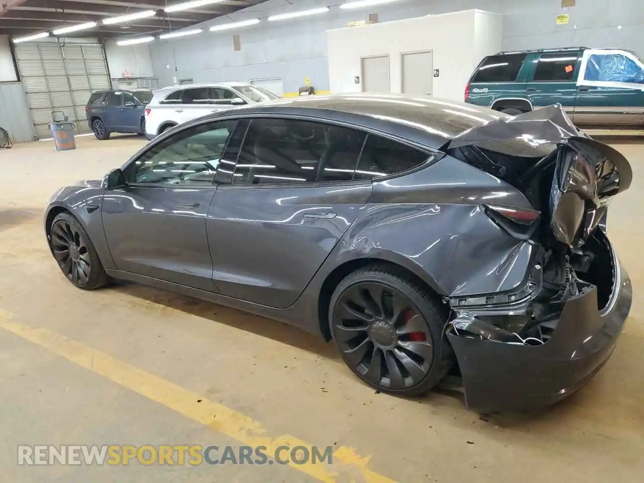 2 Photograph of a damaged car 5YJ3E1EC5NF329373 TESLA MODEL 3 2022