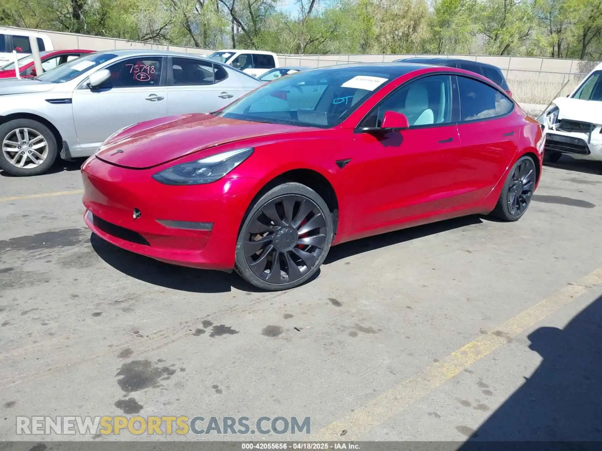2 Photograph of a damaged car 5YJ3E1EC6NF127433 TESLA MODEL 3 2022