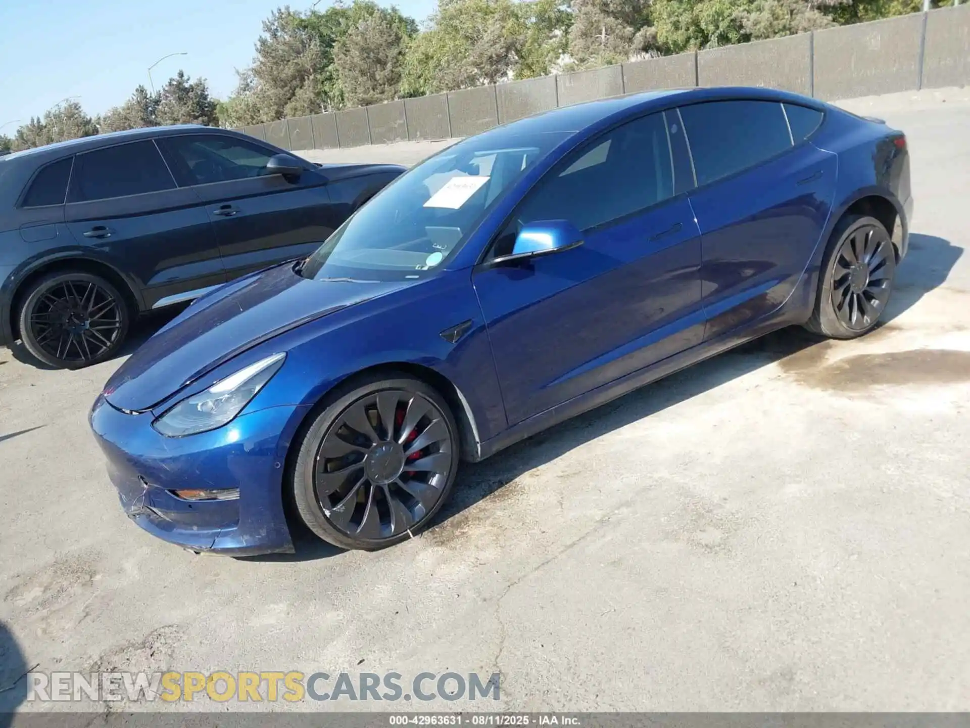 2 Photograph of a damaged car 5YJ3E1EC6NF164949 TESLA MODEL 3 2022