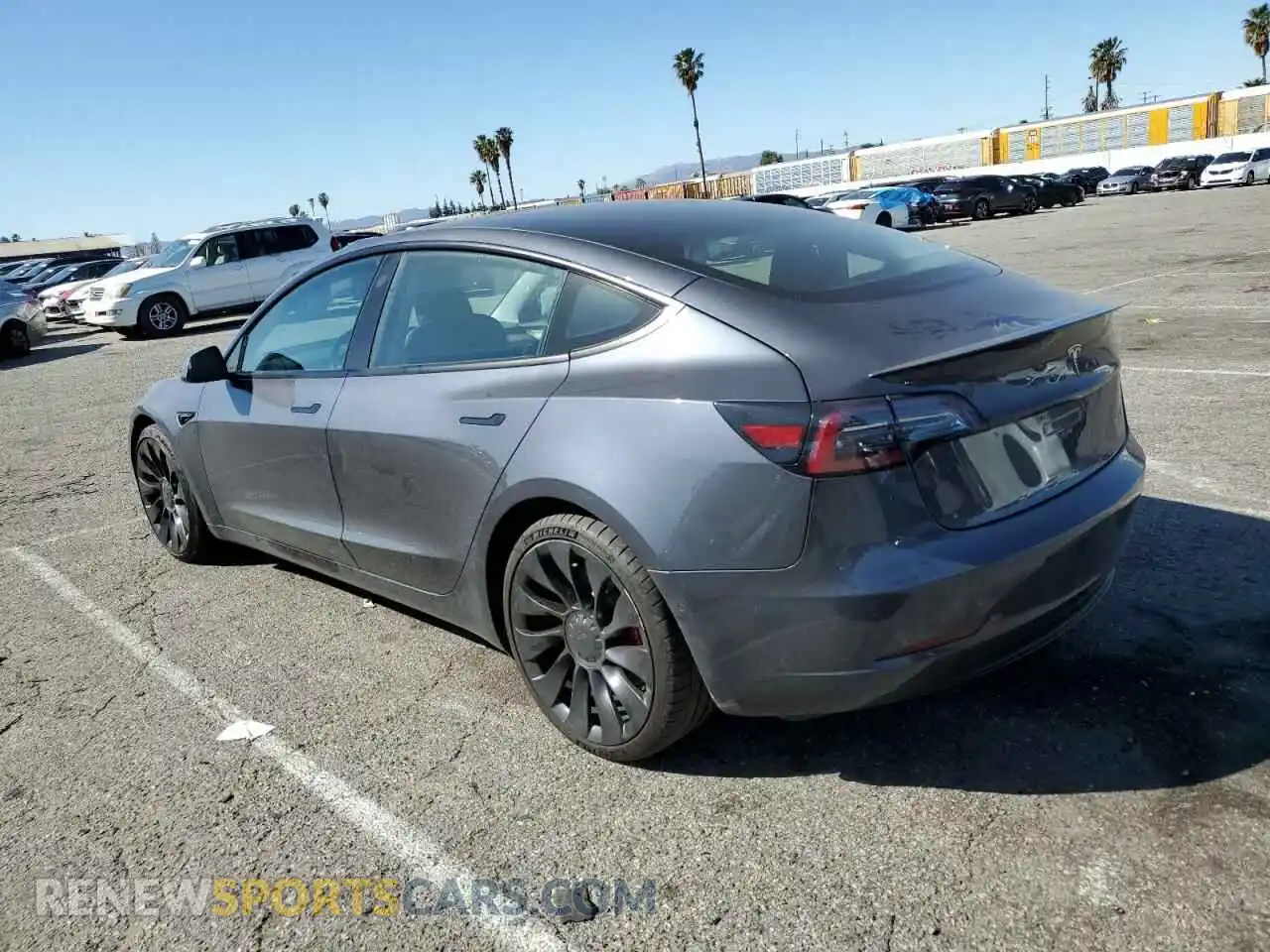 2 Photograph of a damaged car 5YJ3E1EC6NF231565 TESLA MODEL 3 2022