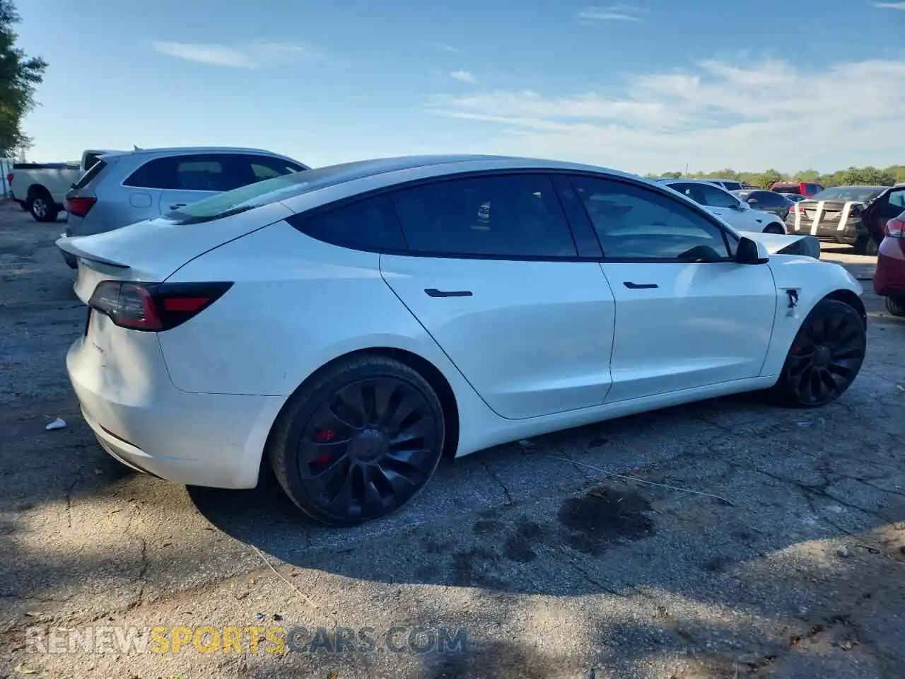 3 Photograph of a damaged car 5YJ3E1EC7NF230408 TESLA MODEL 3 2022