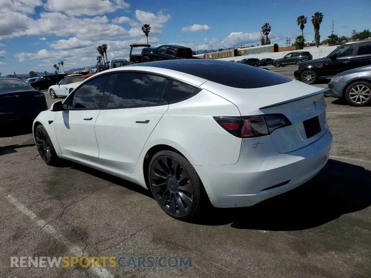 2 Photograph of a damaged car 5YJ3E1EC7NF248083 TESLA MODEL 3 2022