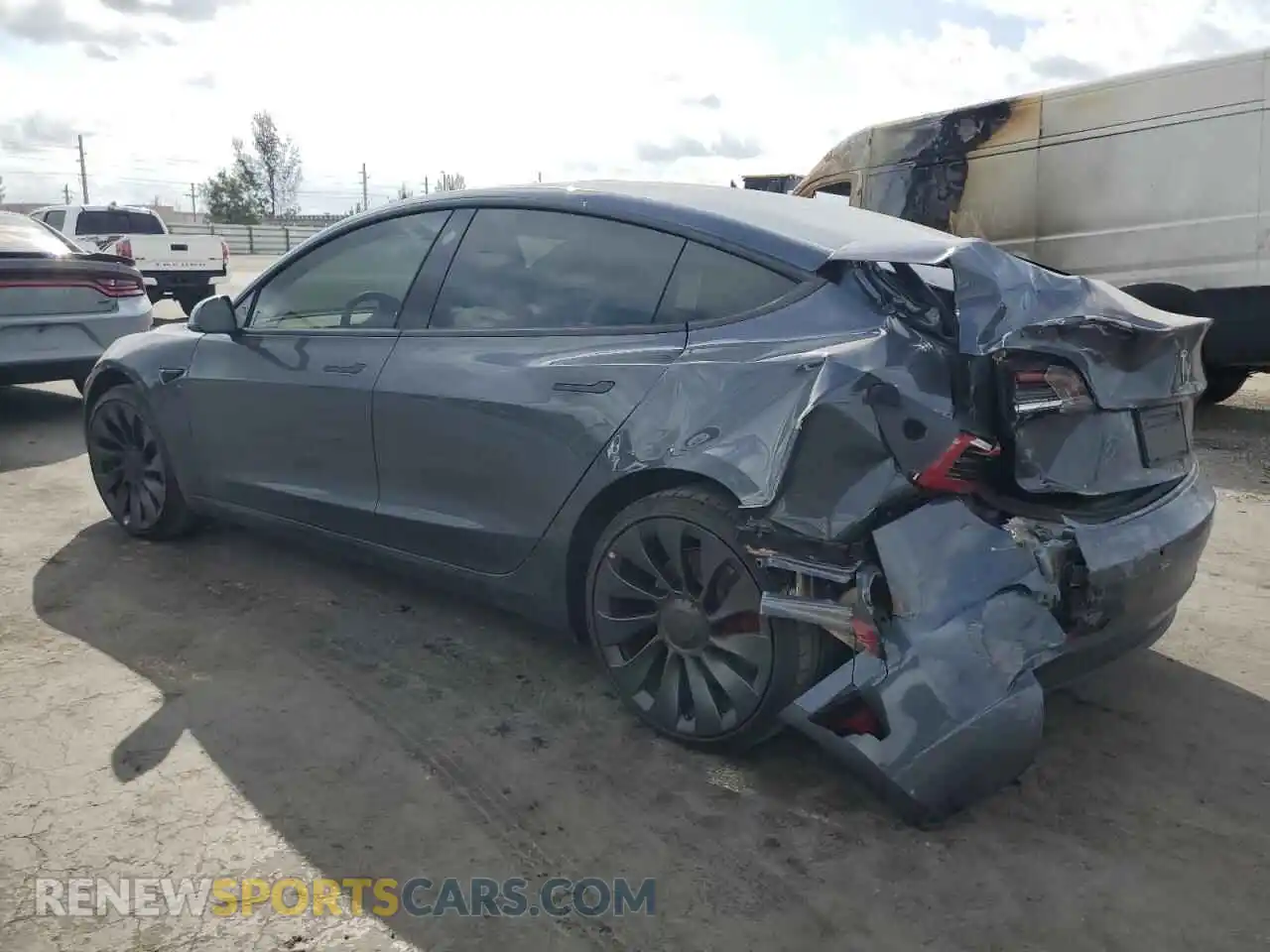 2 Photograph of a damaged car 5YJ3E1EC7NF328869 TESLA MODEL 3 2022