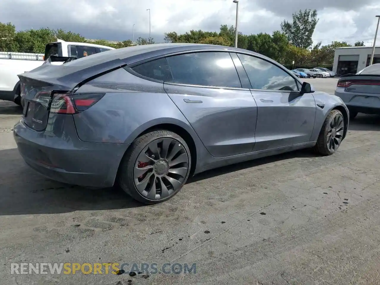 3 Photograph of a damaged car 5YJ3E1EC7NF328869 TESLA MODEL 3 2022