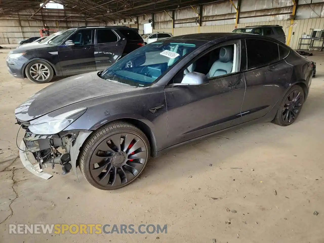 1 Photograph of a damaged car 5YJ3E1EC8NF113663 TESLA MODEL 3 2022