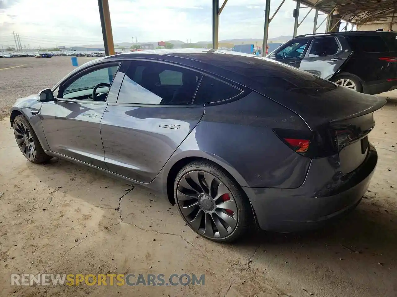 2 Photograph of a damaged car 5YJ3E1EC8NF113663 TESLA MODEL 3 2022