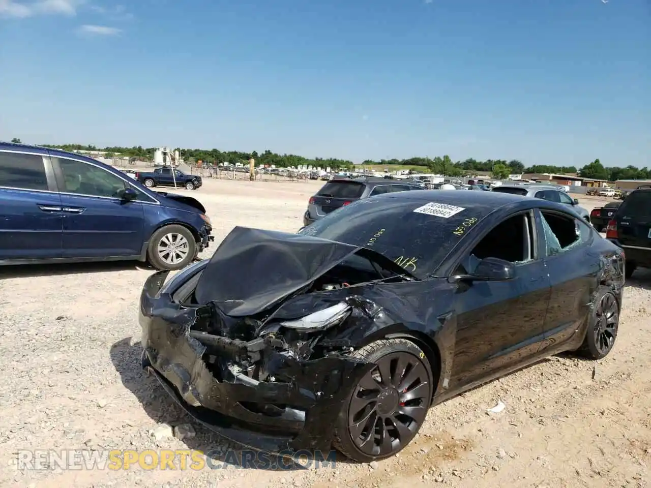 2 Photograph of a damaged car 5YJ3E1EC8NF193529 TESLA MODEL 3 2022