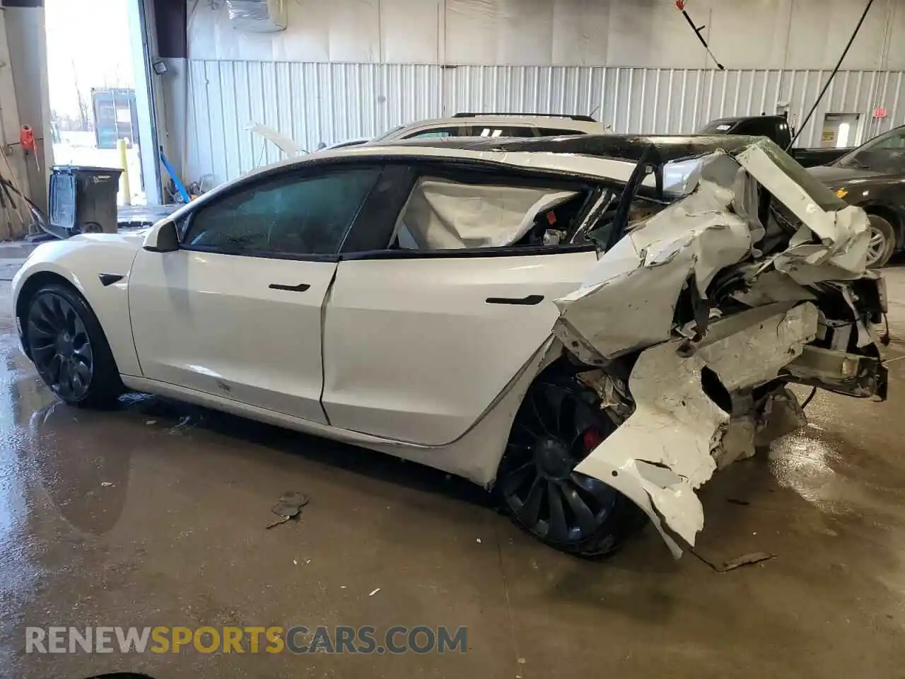 2 Photograph of a damaged car 5YJ3E1EC8NF200530 TESLA MODEL 3 2022