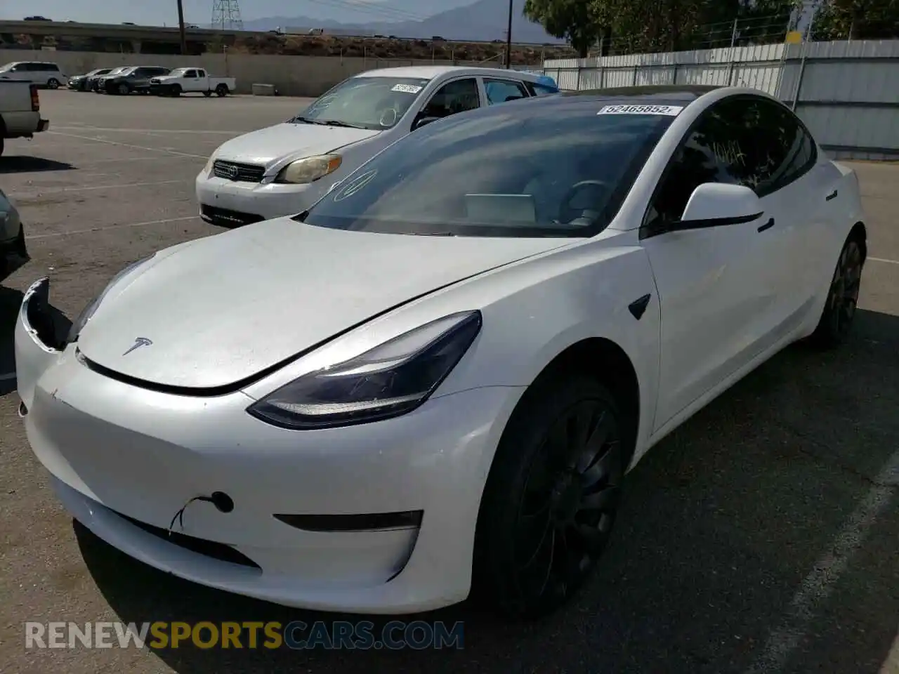 2 Photograph of a damaged car 5YJ3E1EC8NF209079 TESLA MODEL 3 2022