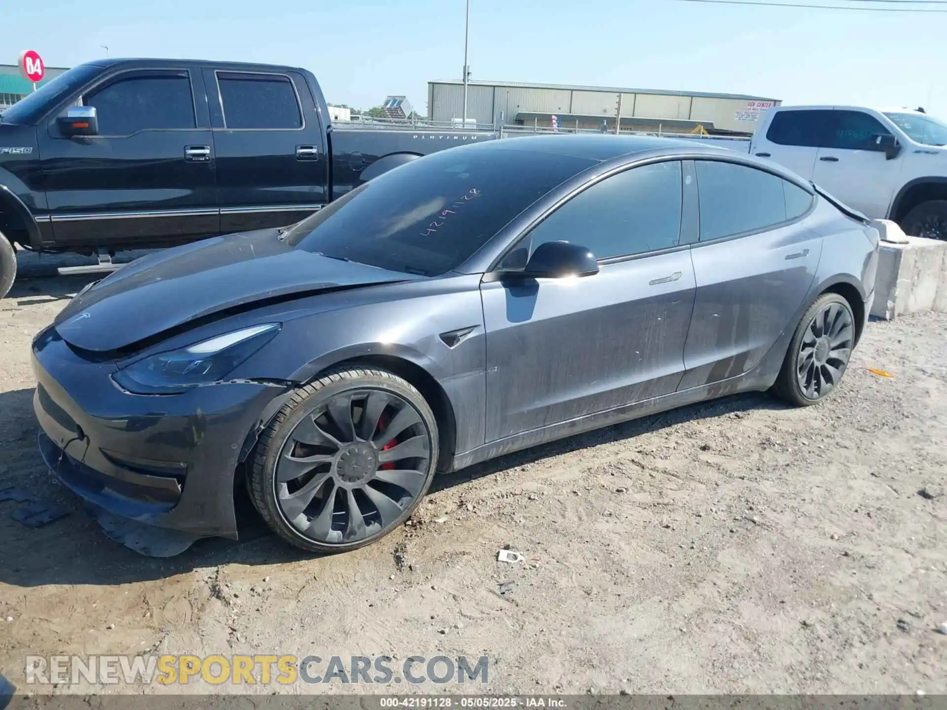 2 Photograph of a damaged car 5YJ3E1EC8NF276975 TESLA MODEL 3 2022