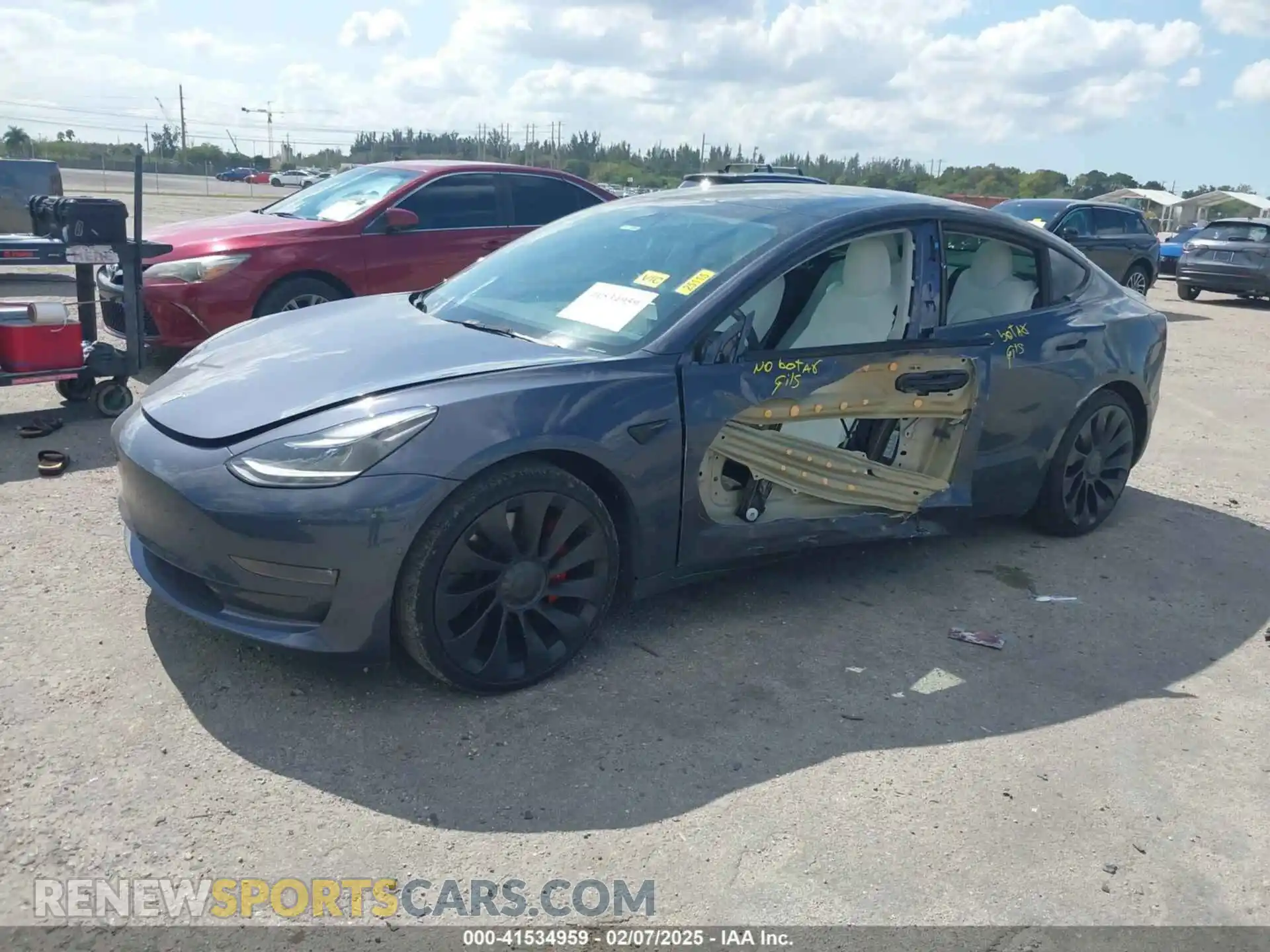 2 Photograph of a damaged car 5YJ3E1EC9NF201184 TESLA MODEL 3 2022
