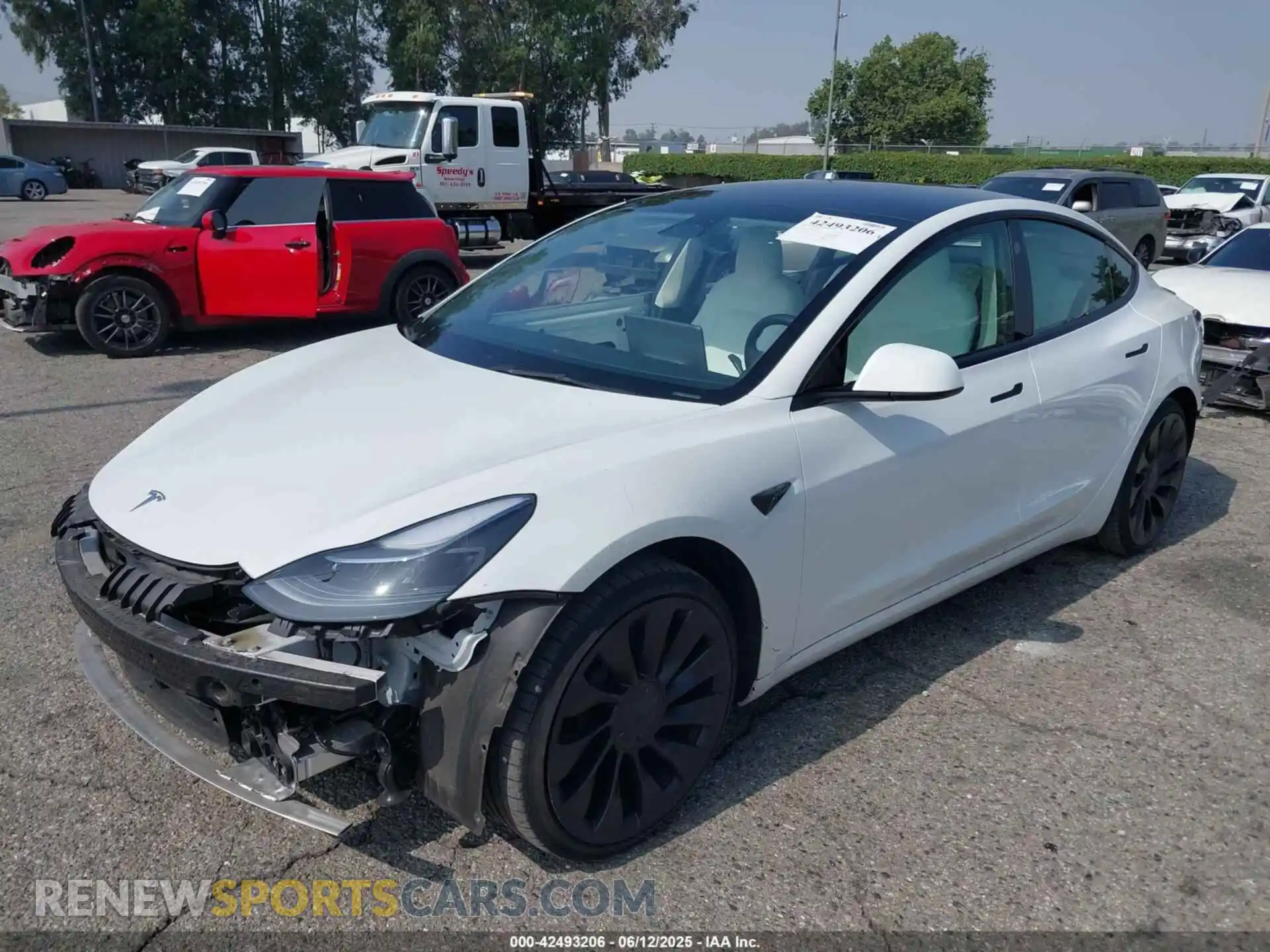 2 Photograph of a damaged car 5YJ3E1EC9NF294837 TESLA MODEL 3 2022