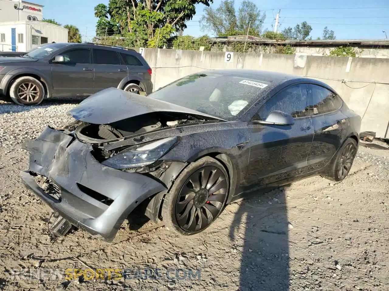 1 Photograph of a damaged car 5YJ3E1ECXNF129640 TESLA MODEL 3 2022