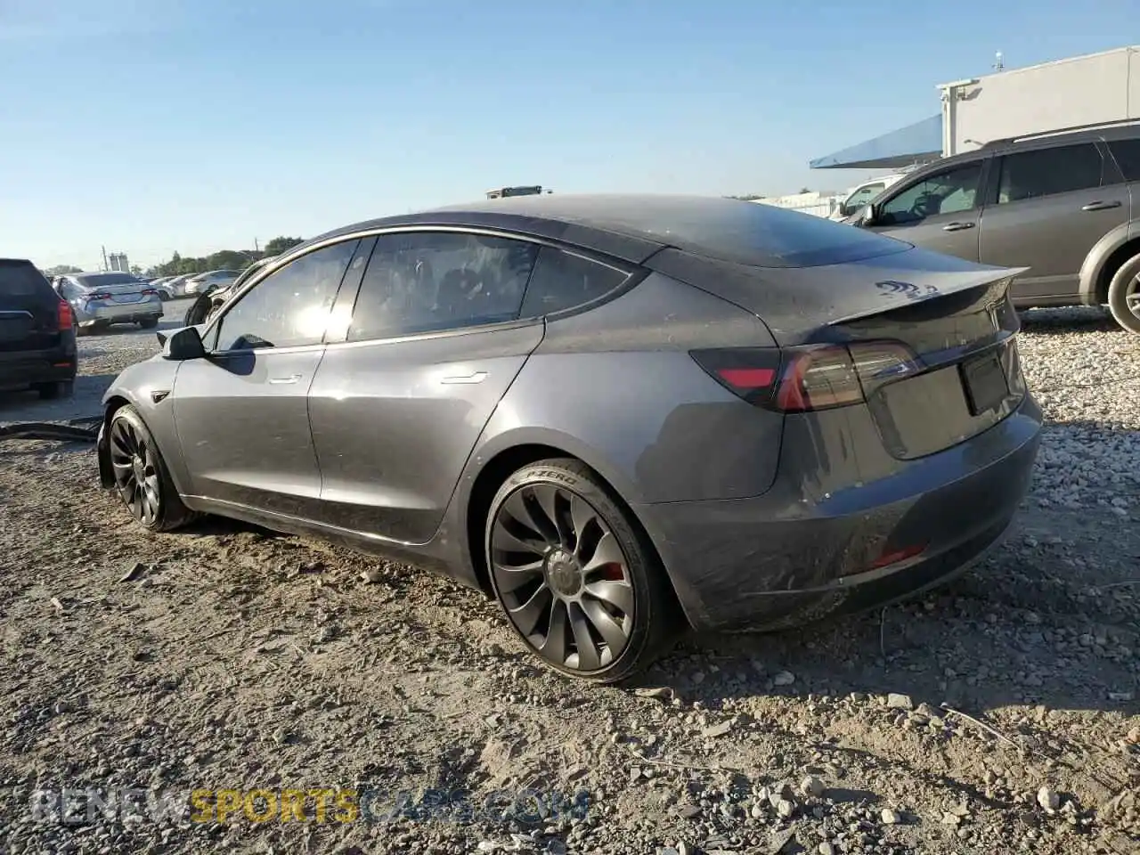 2 Photograph of a damaged car 5YJ3E1ECXNF129640 TESLA MODEL 3 2022