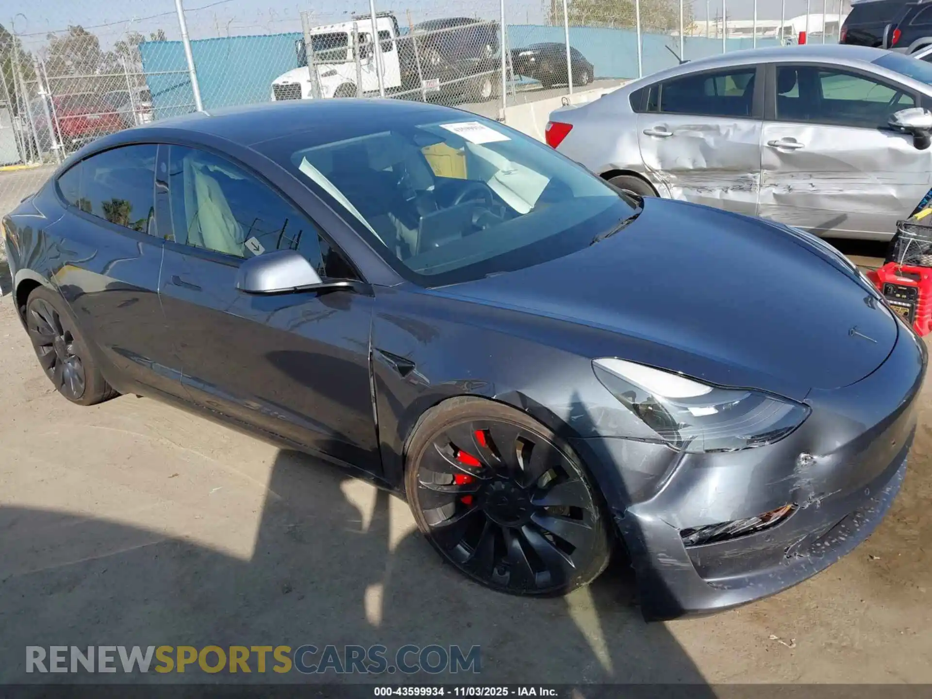 1 Photograph of a damaged car 5YJ3E1ECXNF166994 TESLA MODEL 3 2022