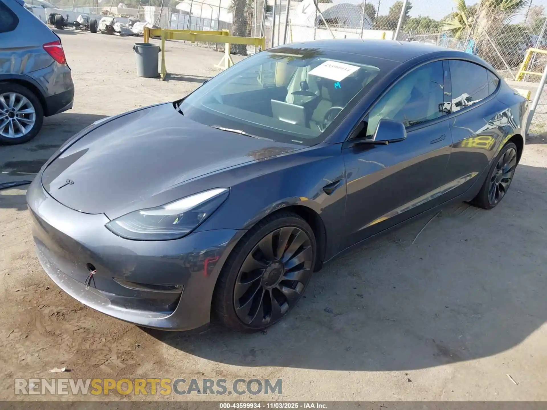 2 Photograph of a damaged car 5YJ3E1ECXNF166994 TESLA MODEL 3 2022