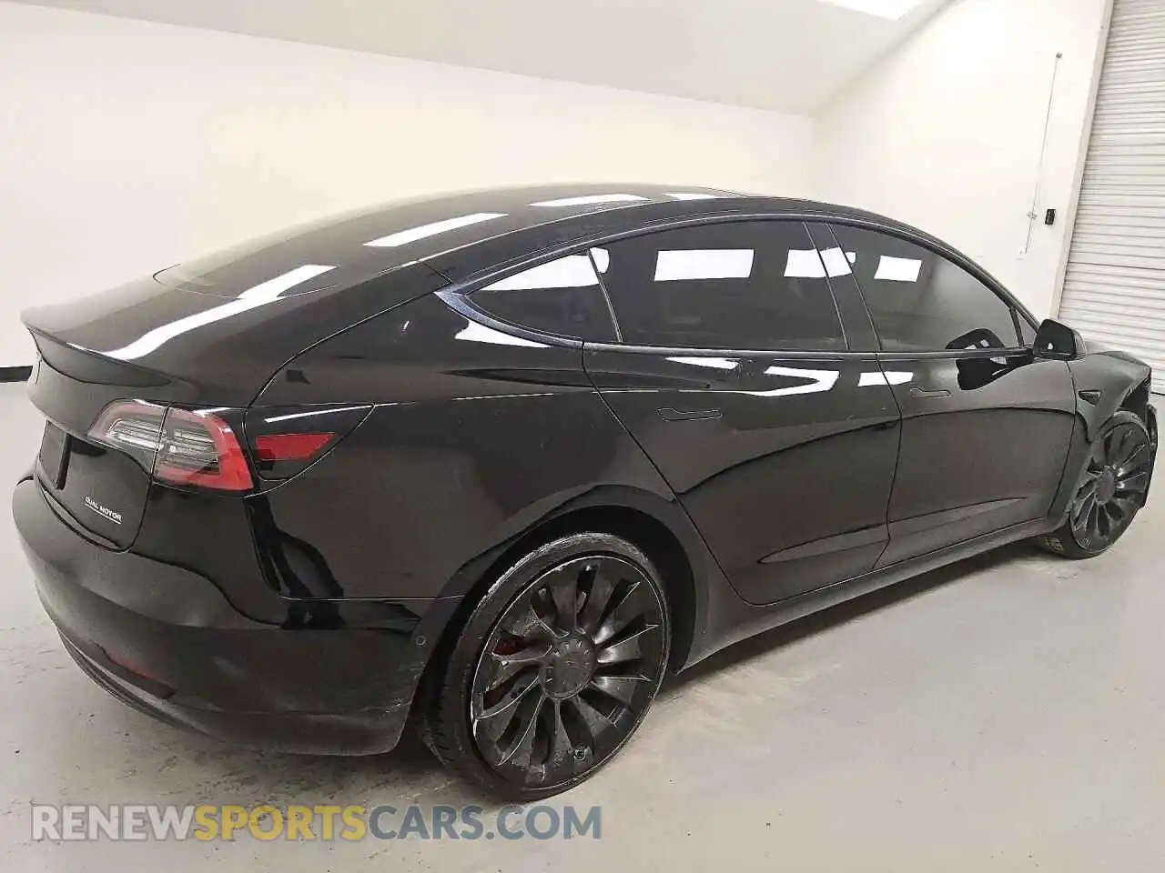 3 Photograph of a damaged car 5YJ3E1ECXNF258493 TESLA MODEL 3 2022