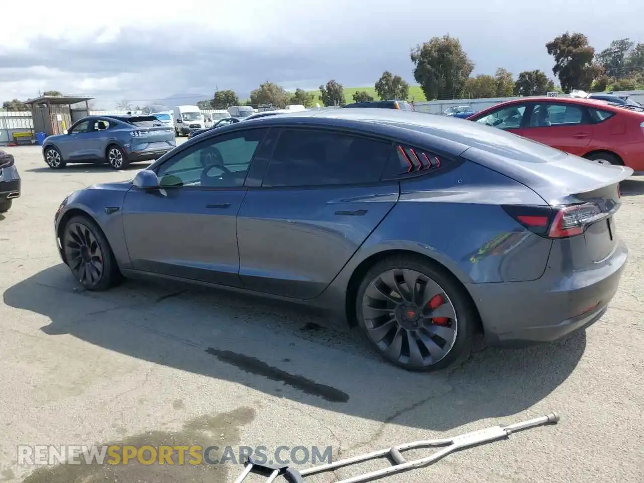 2 fotografías del automóvil dañado 5YJ3E1ECXNF266805 TESLA MODEL 3 2022