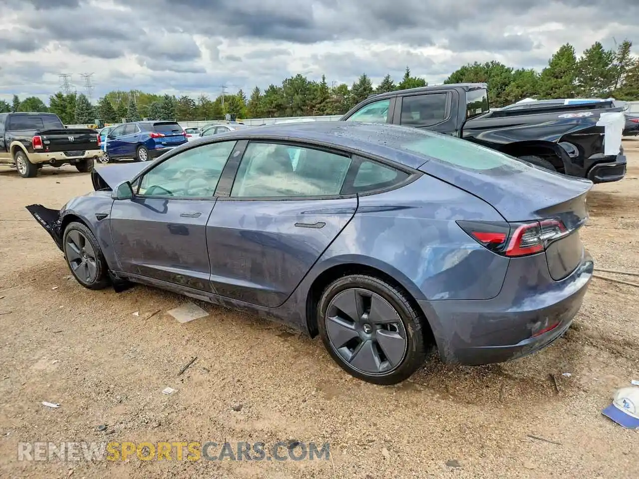 2 fotografías del automóvil dañado 5YJ3E1EA0PF406670 TESLA MODEL 3 2023