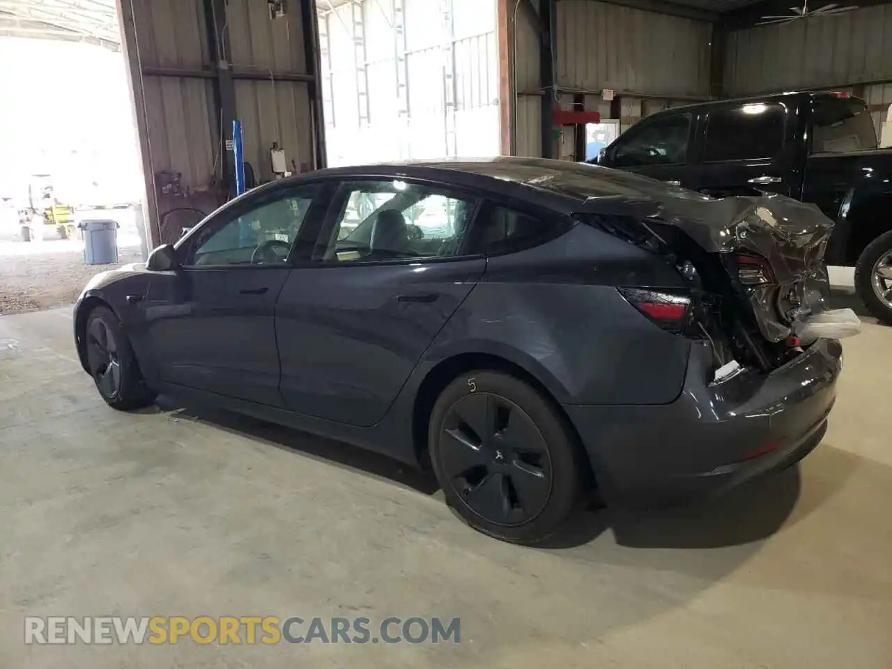 2 Photograph of a damaged car 5YJ3E1EA0PF412422 TESLA MODEL 3 2023