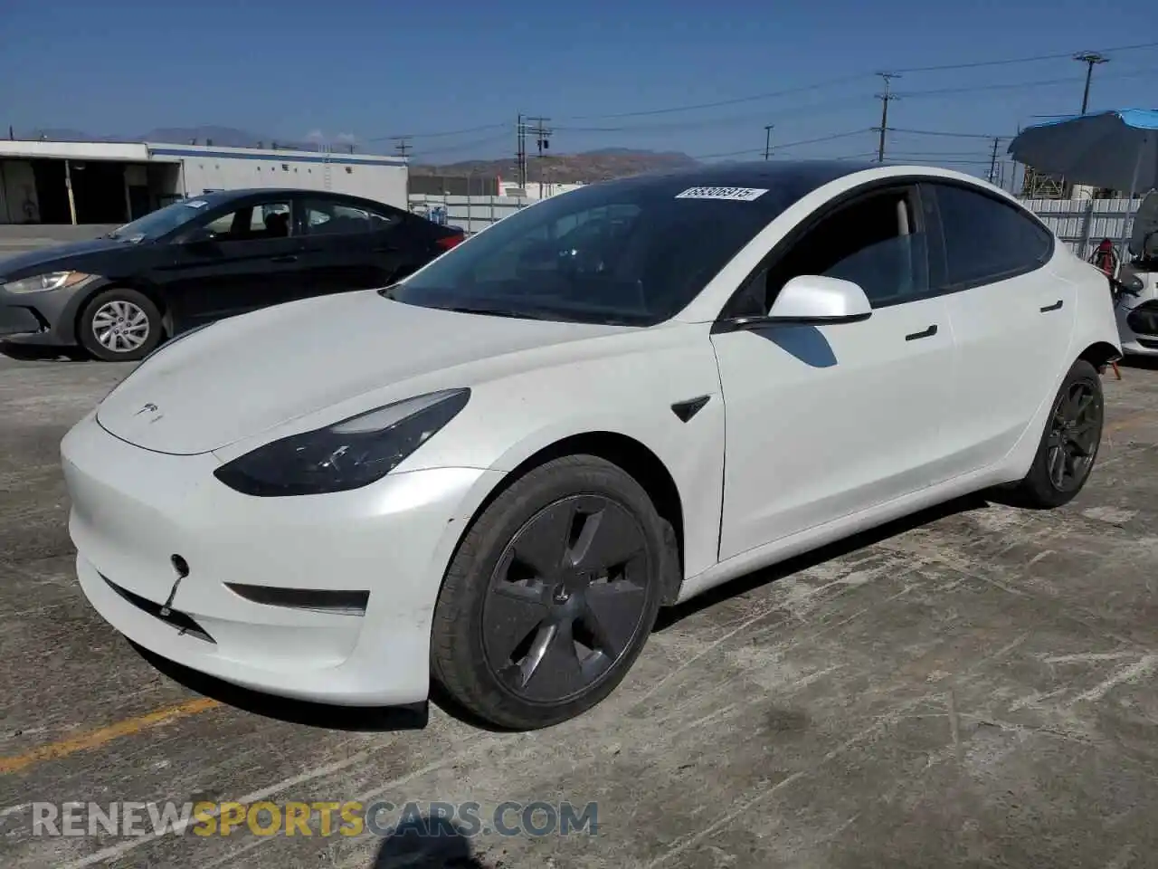 1 Photograph of a damaged car 5YJ3E1EA0PF486228 TESLA MODEL 3 2023