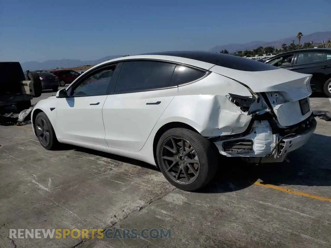 2 Photograph of a damaged car 5YJ3E1EA0PF486228 TESLA MODEL 3 2023