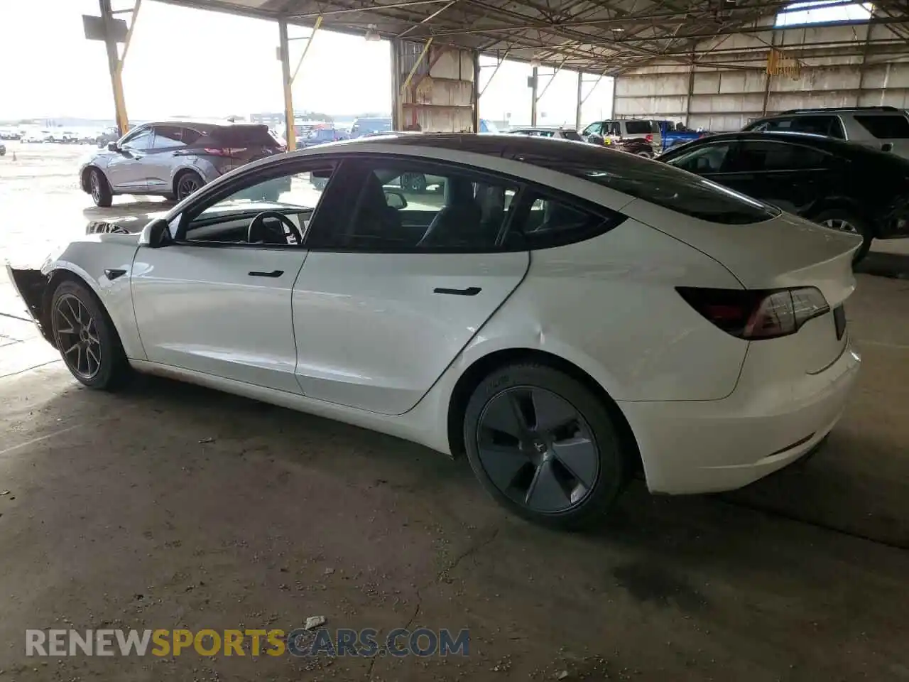 2 Photograph of a damaged car 5YJ3E1EA0PF493597 TESLA MODEL 3 2023