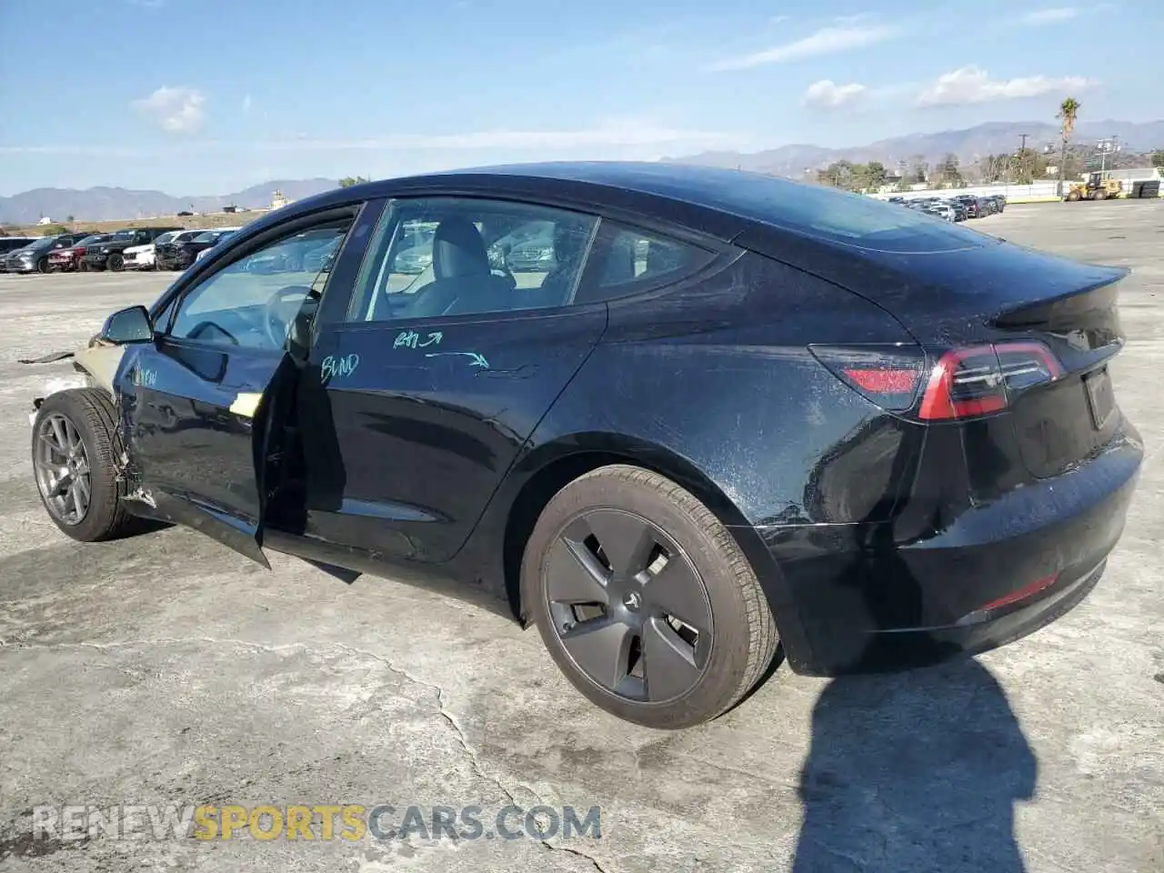 2 Photograph of a damaged car 5YJ3E1EA0PF585308 TESLA MODEL 3 2023