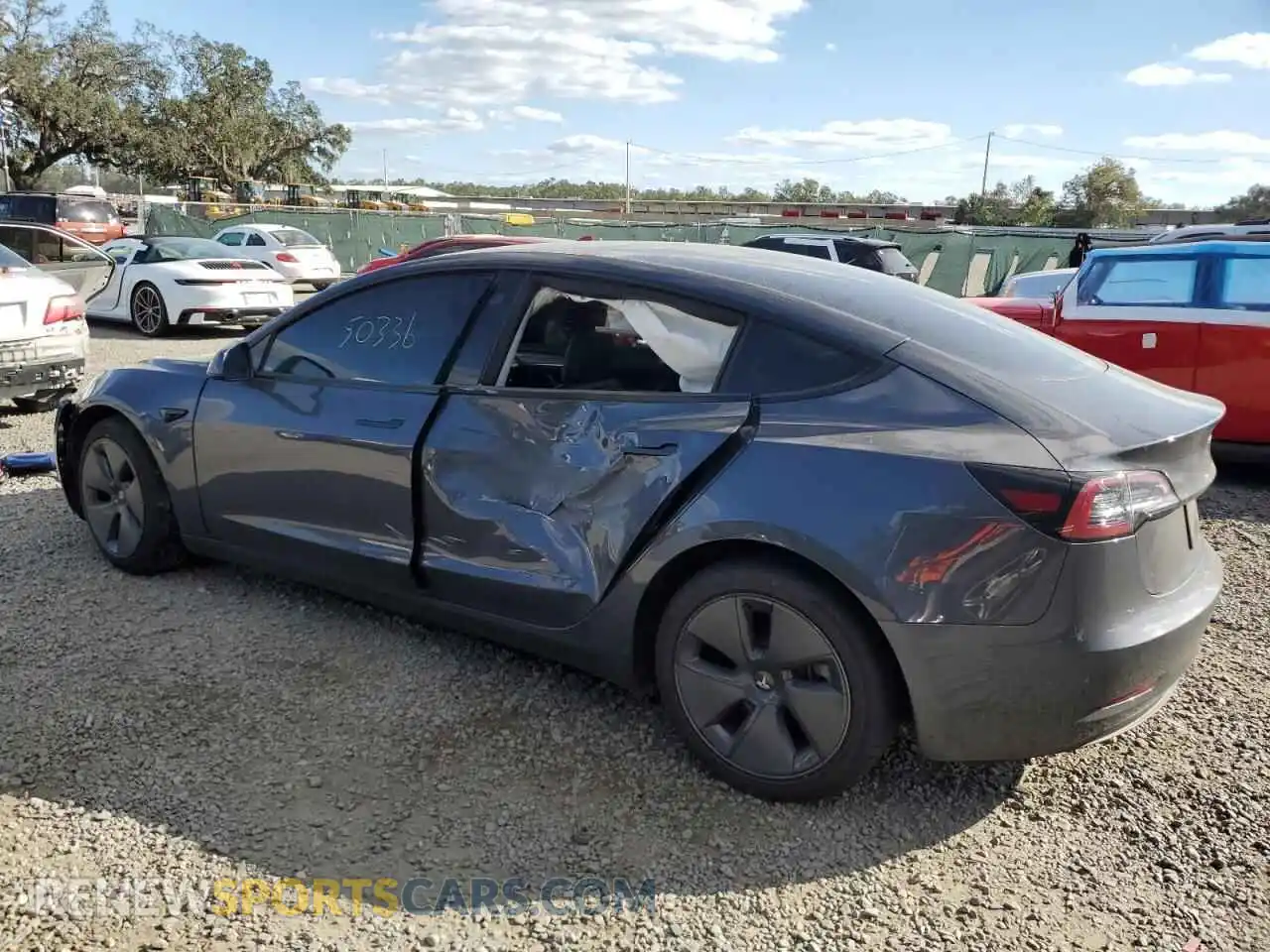 2 Photograph of a damaged car 5YJ3E1EA1PF409237 TESLA MODEL 3 2023