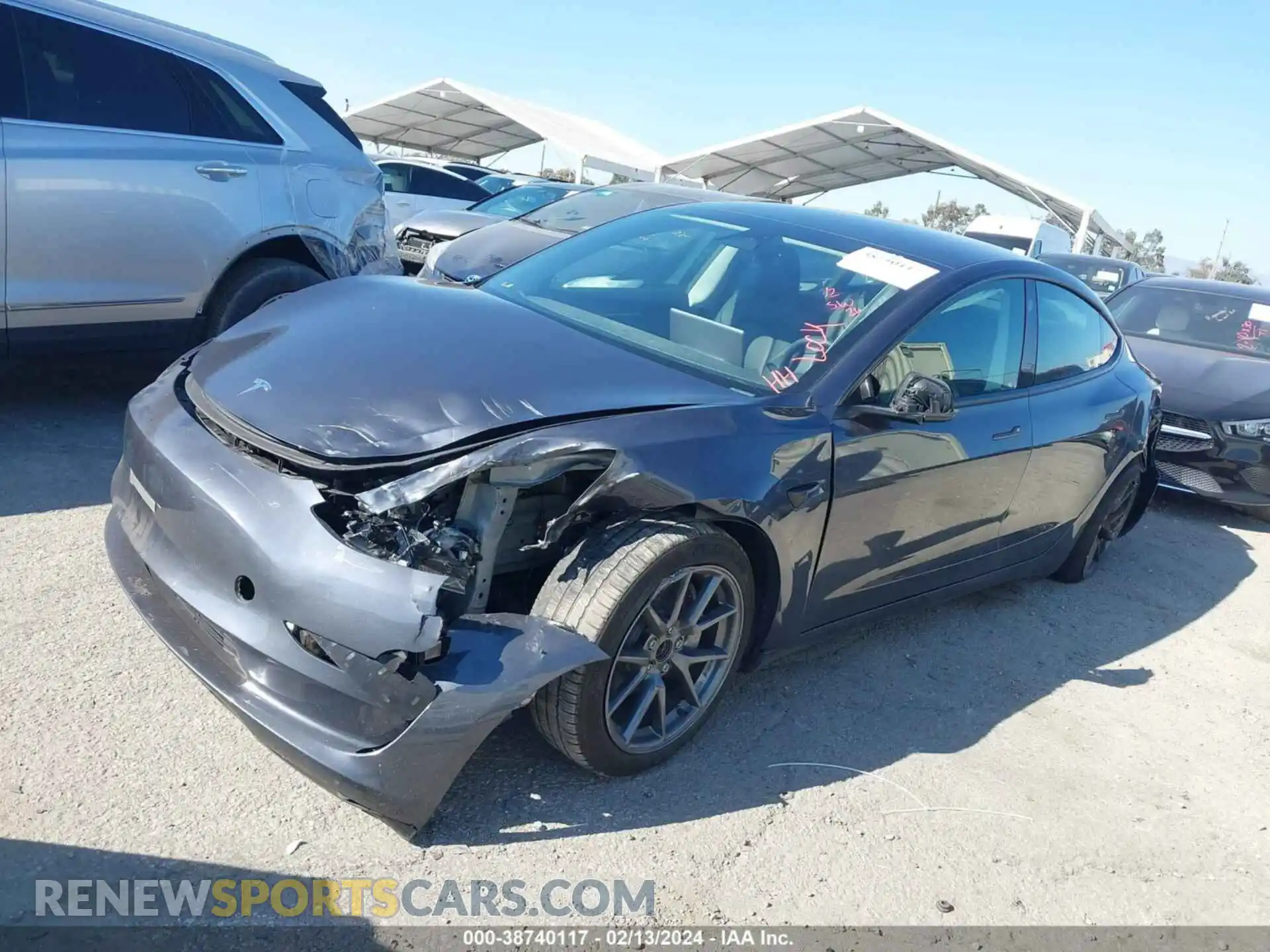 2 Photograph of a damaged car 5YJ3E1EA2PF412552 TESLA MODEL 3 2023